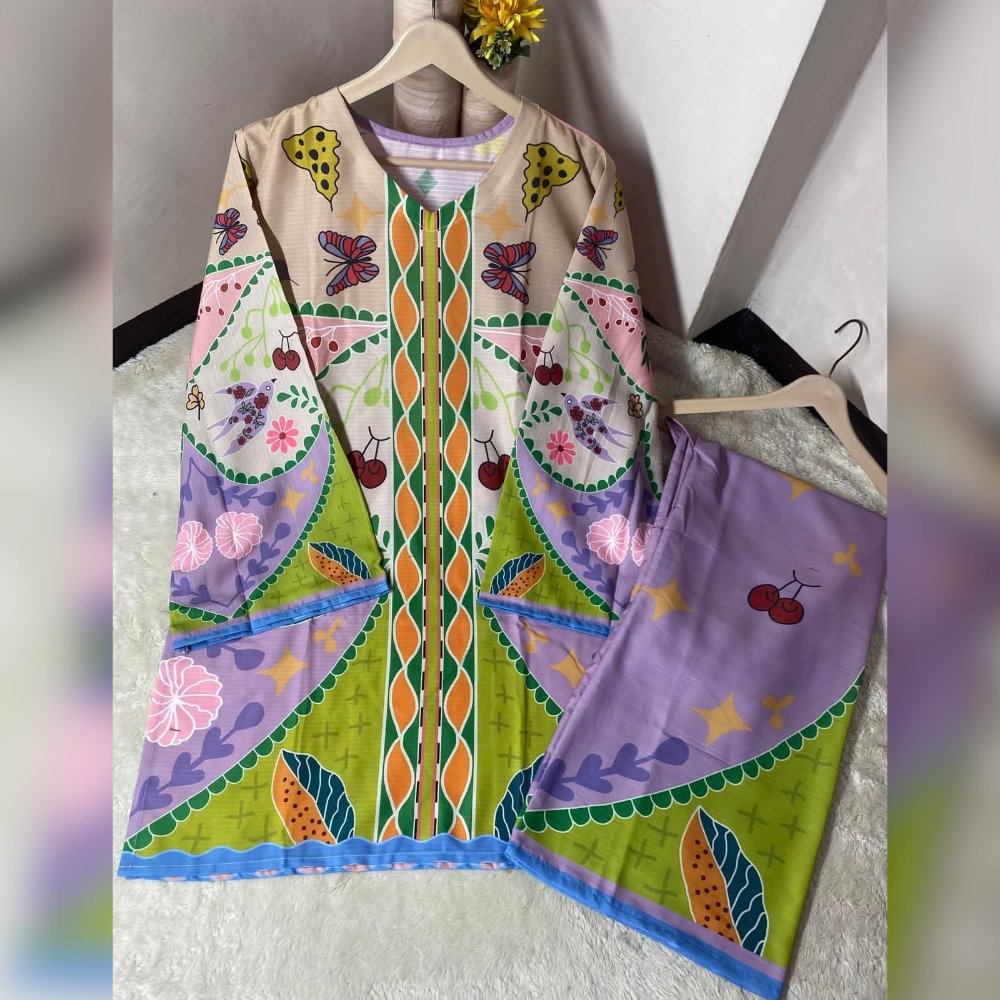 Colorful dress with floral and butterfly patterns on a hanger against a white background