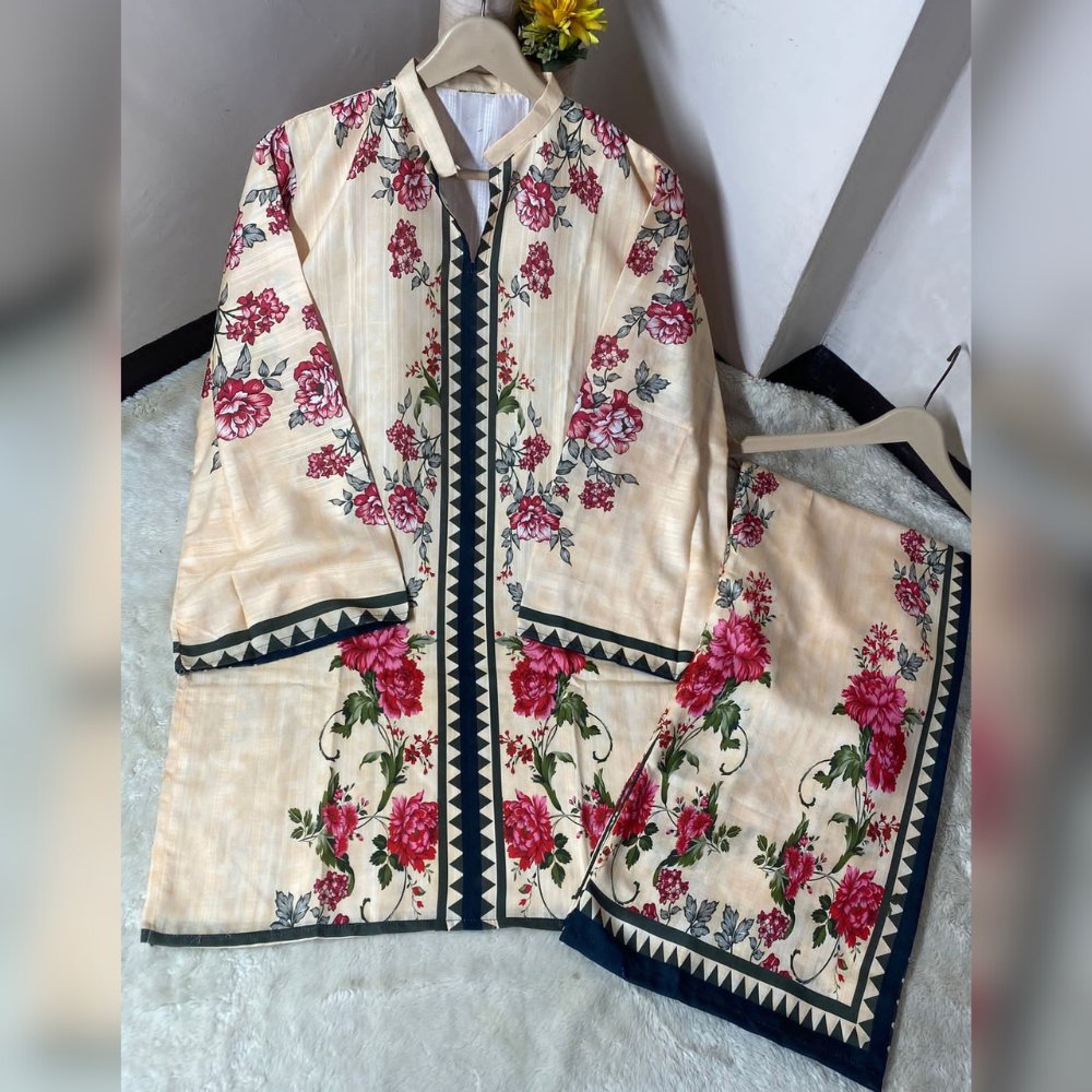 Floral patterned garment on a hanger against a neutral background