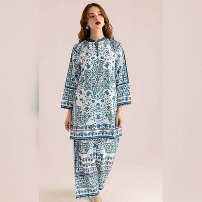 Woman wearing a blue and white patterned outfit on a beige background