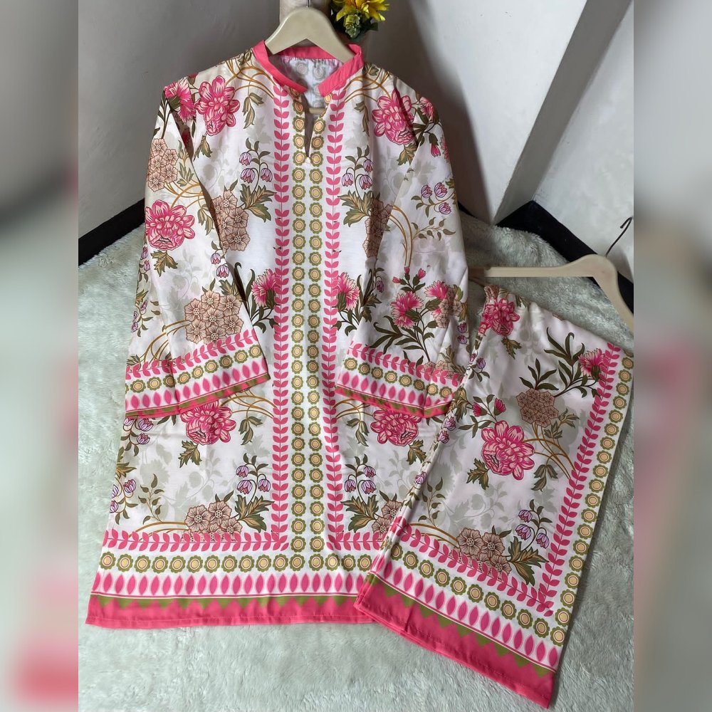 Floral patterned outfit on a hanger against a neutral background