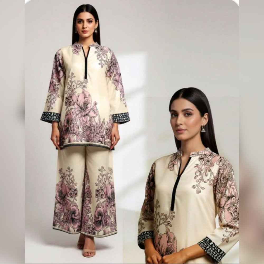 Woman wearing a floral outfit with a plain background