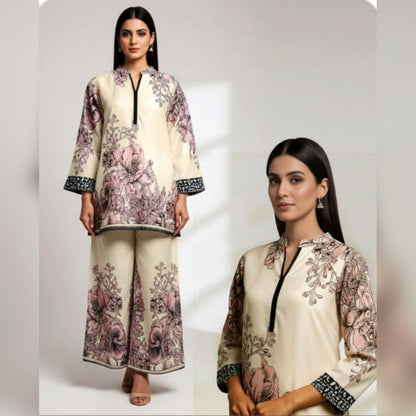 Woman wearing a floral outfit with a plain background