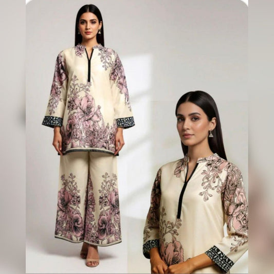 Woman wearing a floral outfit with a plain background