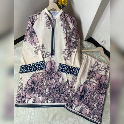 Floral patterned outfit on a hanger against a neutral background