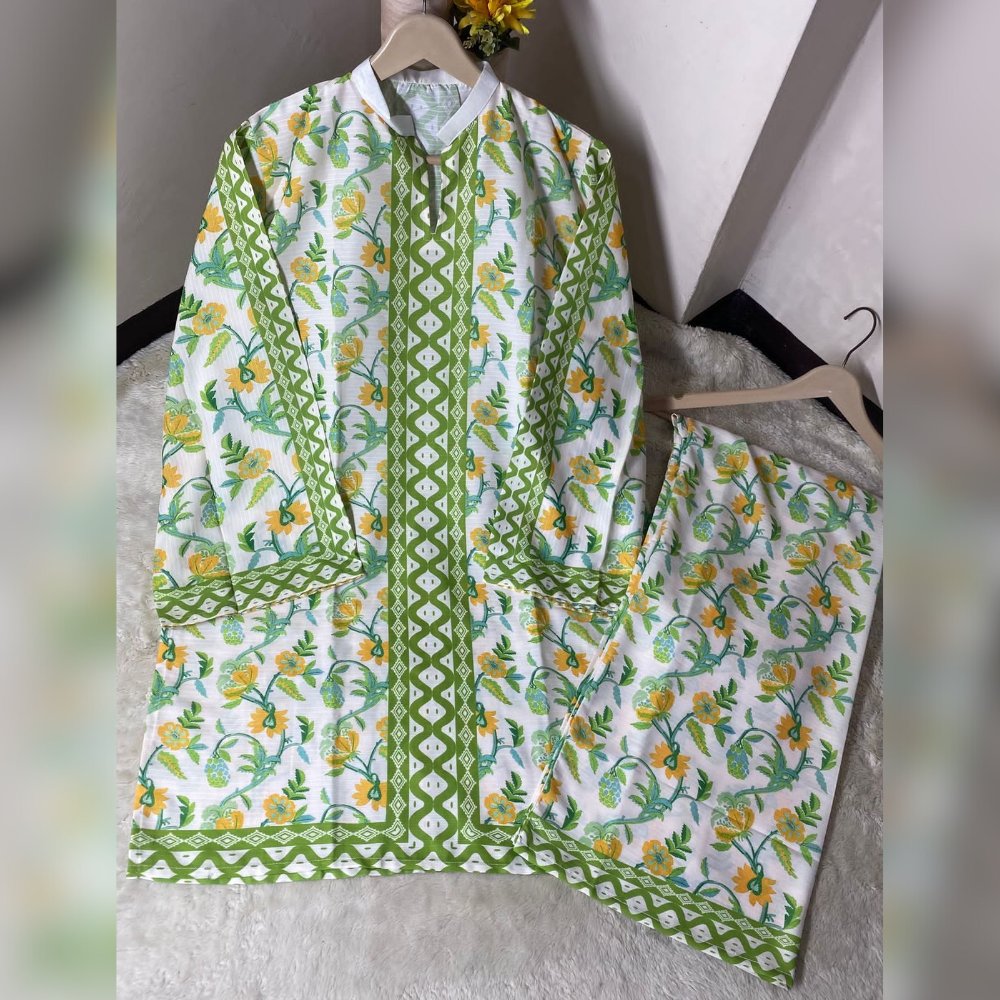 Floral and geometric patterned outfit on a hanger against a neutral background