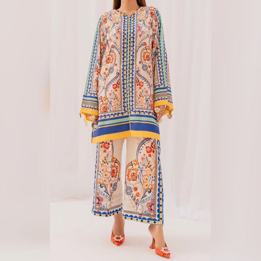 Colorful floral patterned outfit on a white background