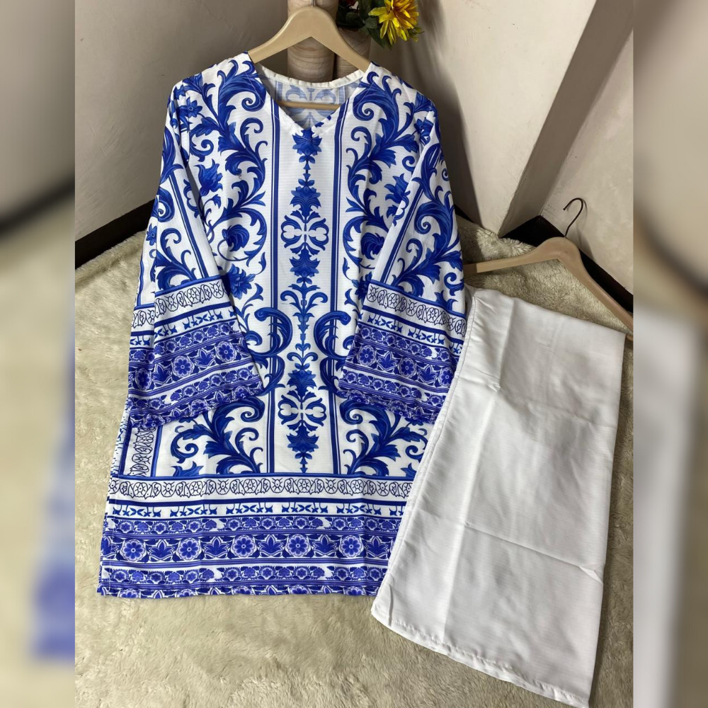 Blue and white patterned shirt on a hanger against a neutral wall.
