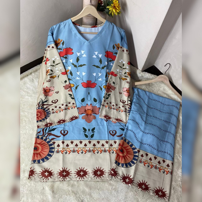 Traditional outfit with floral patterns on a hanger against a neutral background