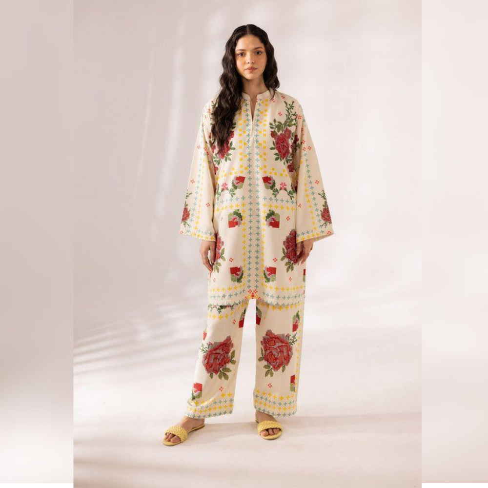 Woman wearing a floral outfit on a white background