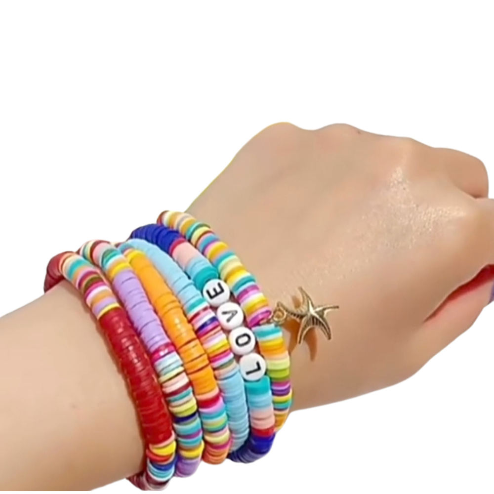 Beads worn on a girl’s hand from the DIY set