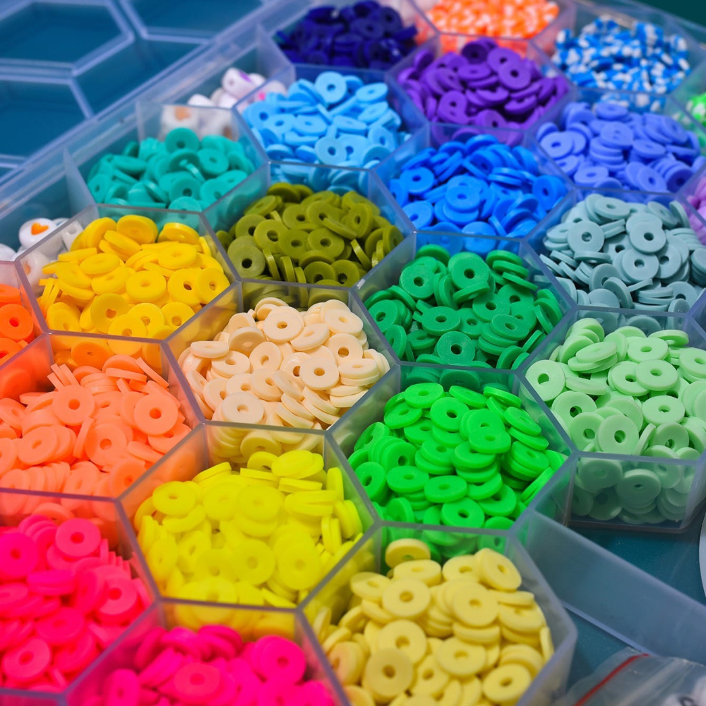 Front view of girls' DIY beads set box with rings