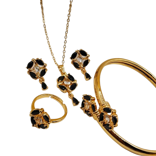 Front view of black coloured China gold plated locket set