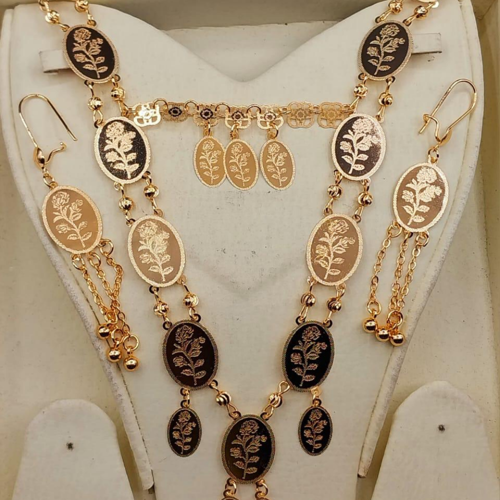 Gold plated set displayed on dummy model for full look