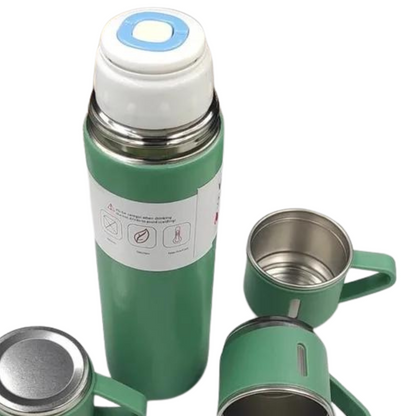 Overhead view of green flask with cup