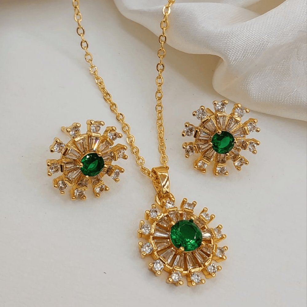 Green-colored round locket set with matching earrings, front view