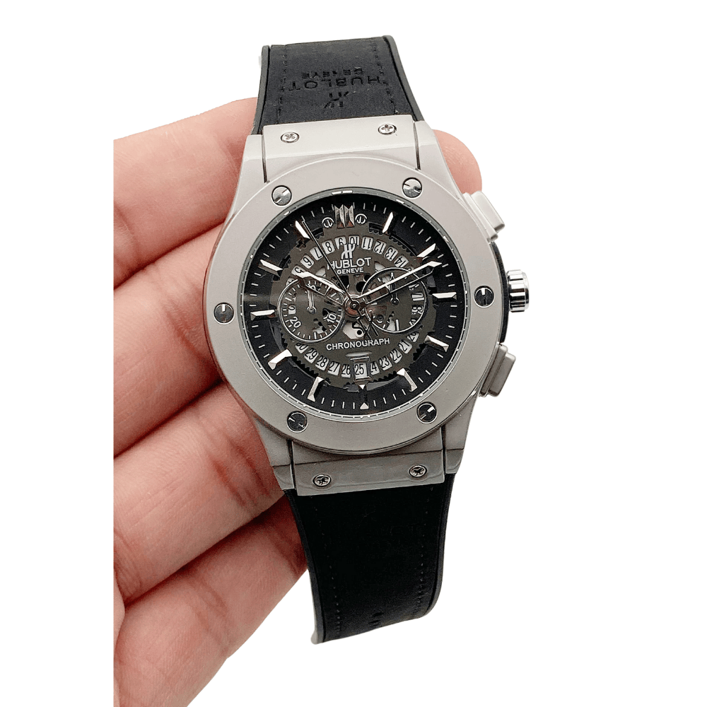 Hublot date watch with silver dial and black strap