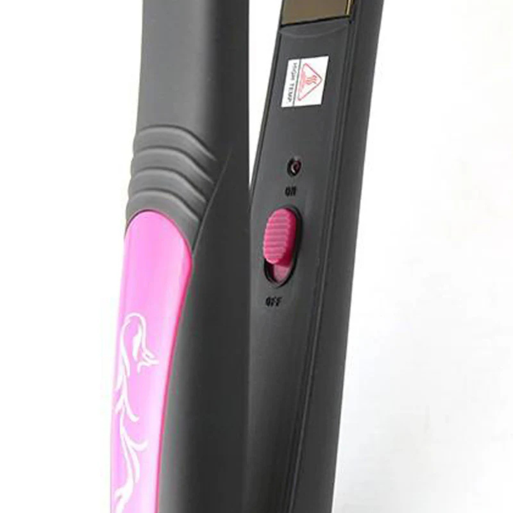 Close-up of the KM-328 straightener's on/off switch