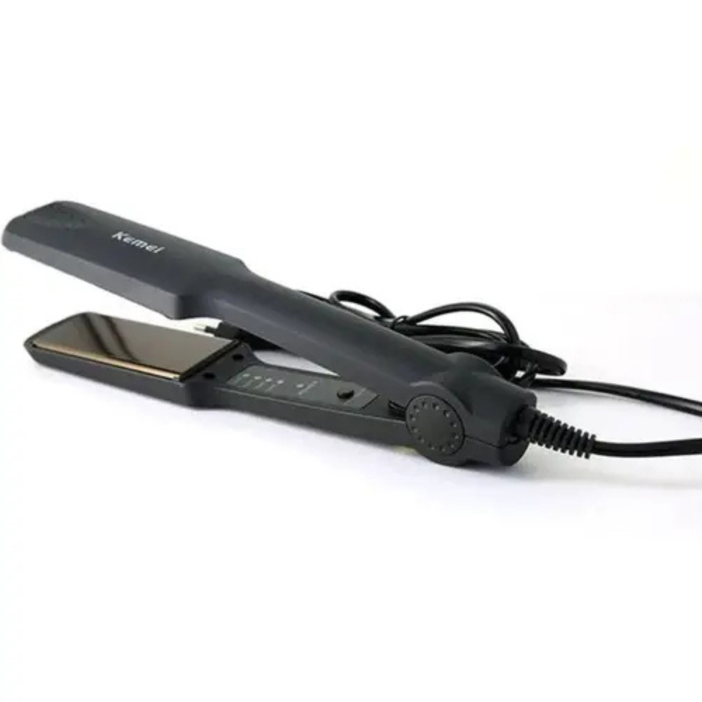 Close-up of switch control on Kemei KM-329 Hair Straightener