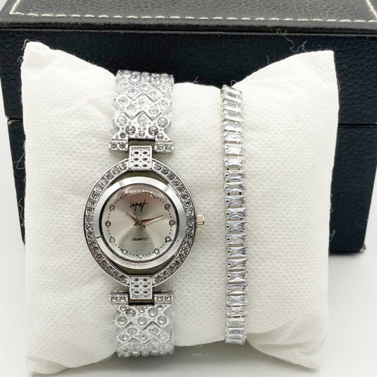 Silver watch with diamond-like accents on a white cushion