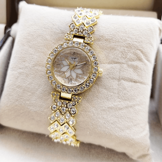 Close-up of MH Stone golden ladies jewellery watch