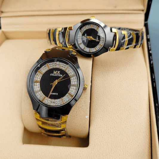 Close-up of the black MK couple watch featuring gold accents.