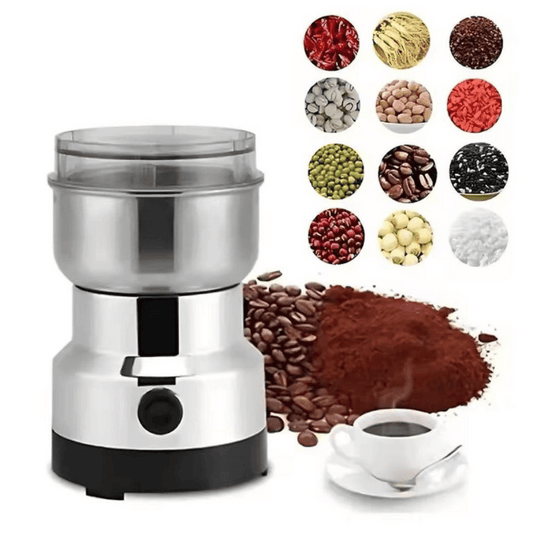 Coffee grinder with coffee beans, ground coffee, and a cup of coffee on a white background.