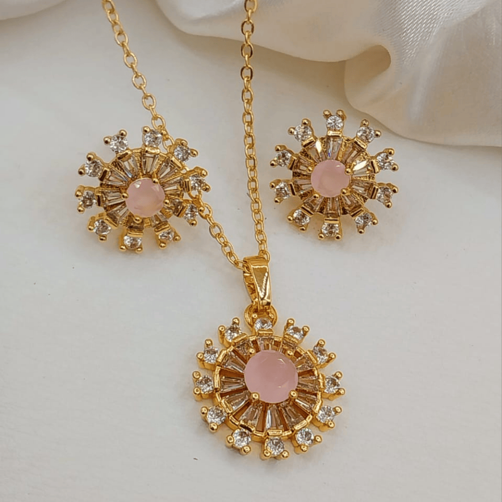 Peach-colored round artificial locket with earrings shown from the front