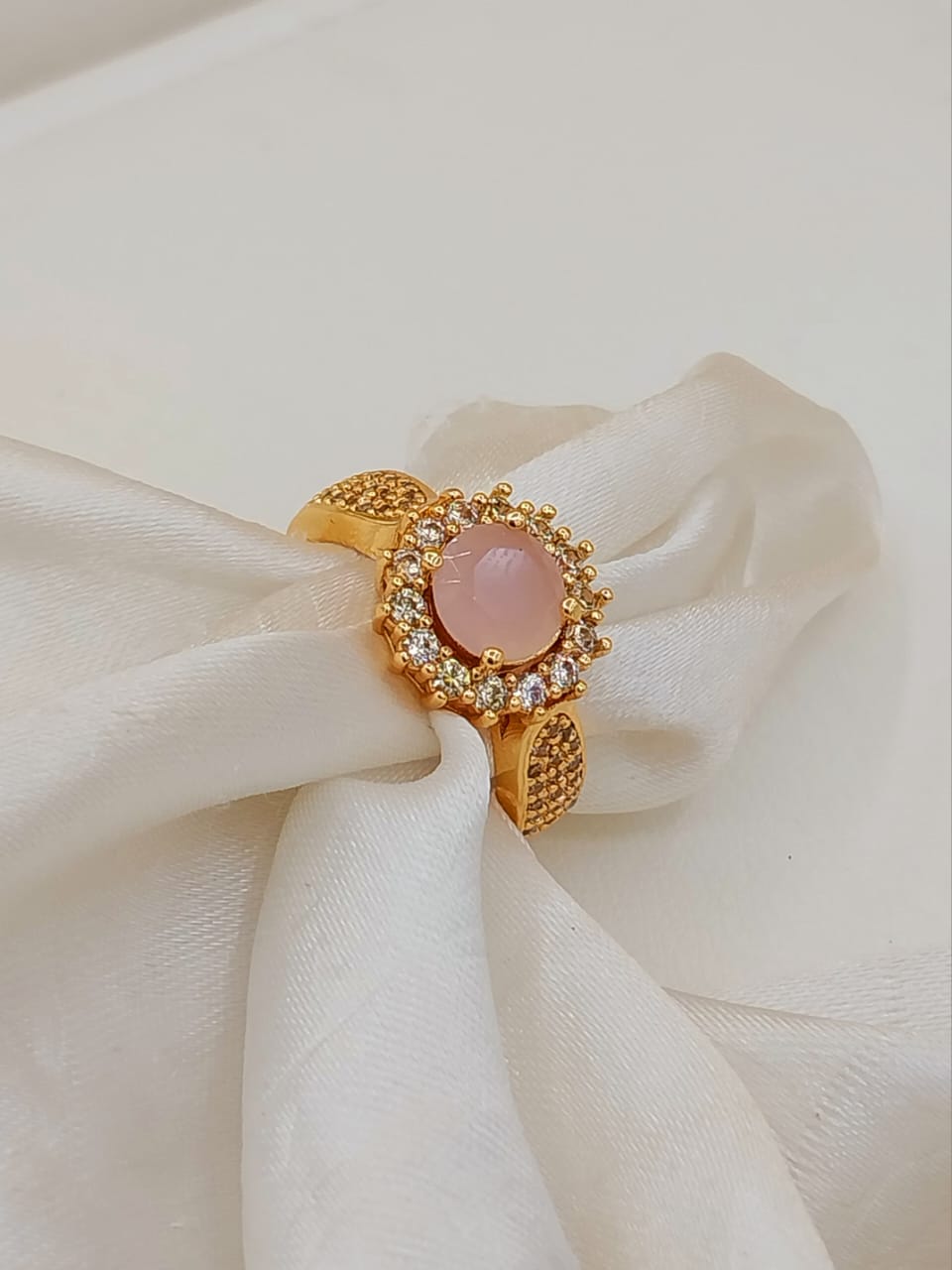 Soft peach colored gold plated ring upper view
