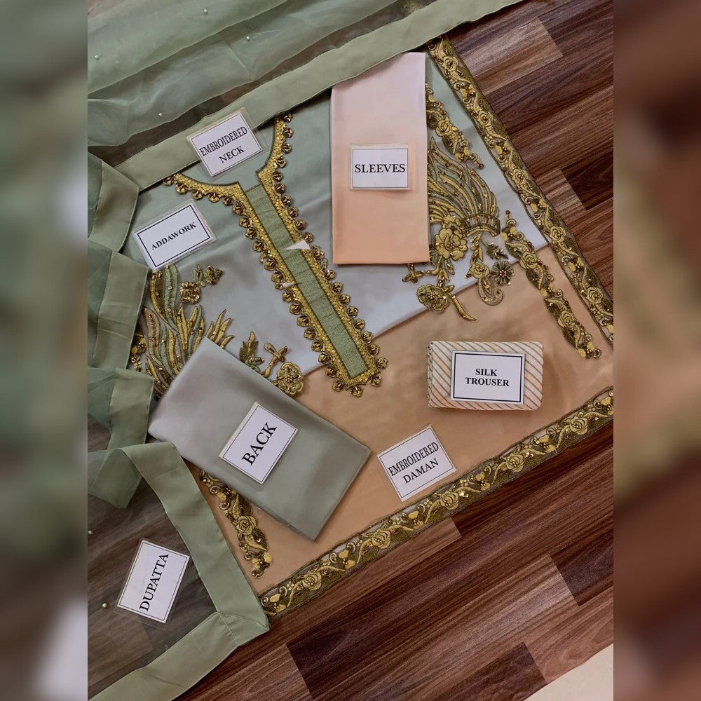 Fabric swatches with labels on a wooden surface