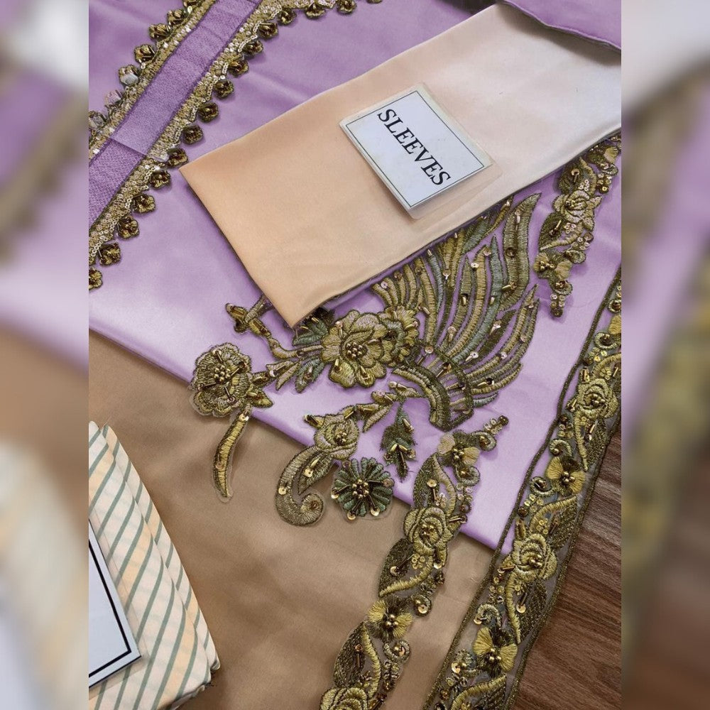 Decorative fabric with gold embroidery on a purple background, labeled 'SLEEVES'.