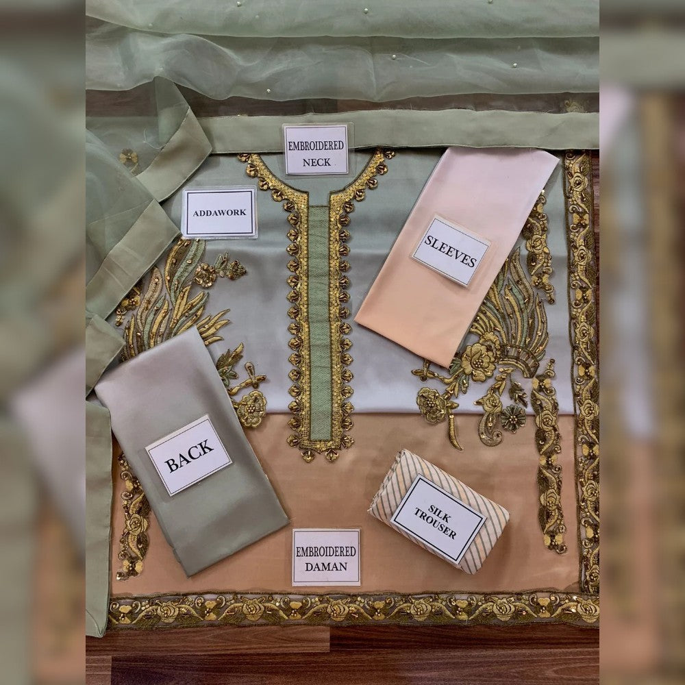 Fabric swatches with embroidered details on a decorative background