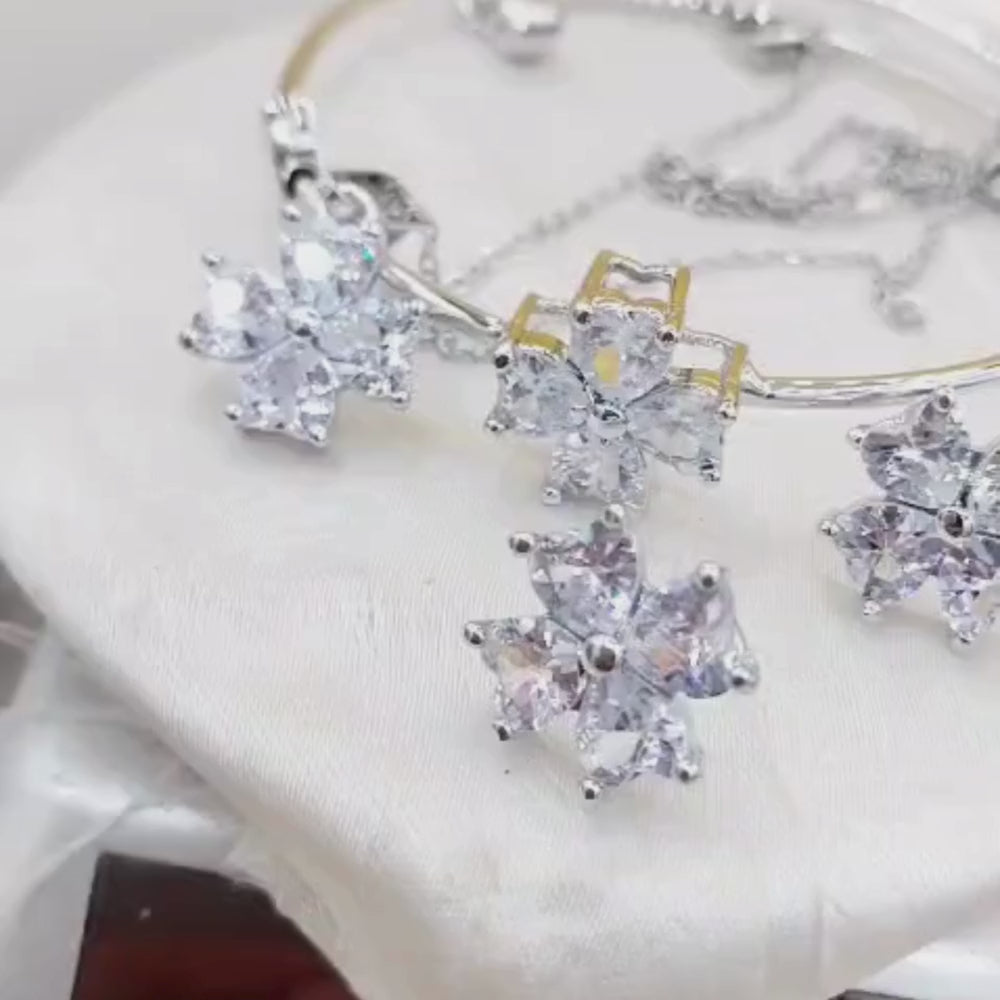 Rotational video snapshot showing full silver locket set