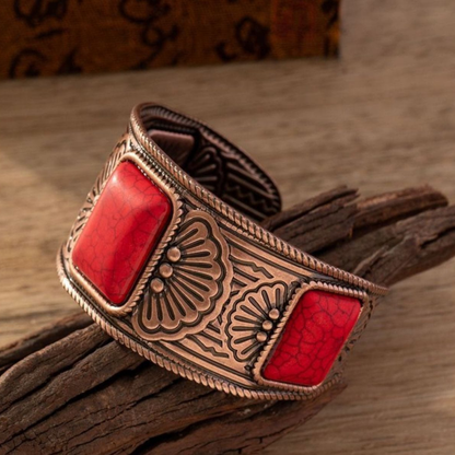 Detailed close-up of red antique artificial bangle