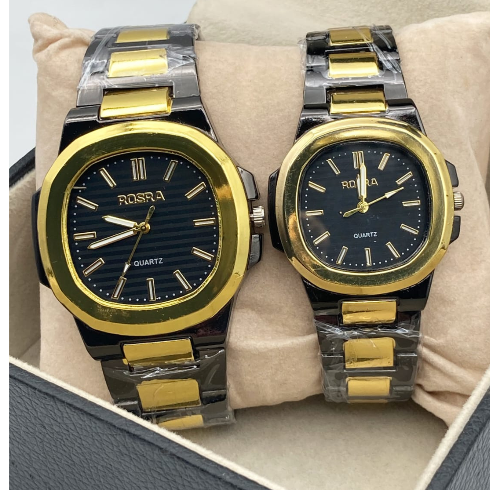 Two Rosra watches with gold and silver bands on a beige cushion.