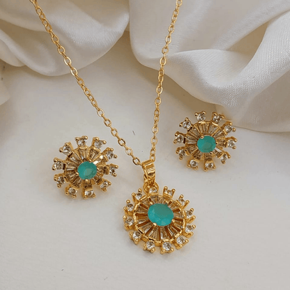 Sea green locket and earrings set viewed from the front