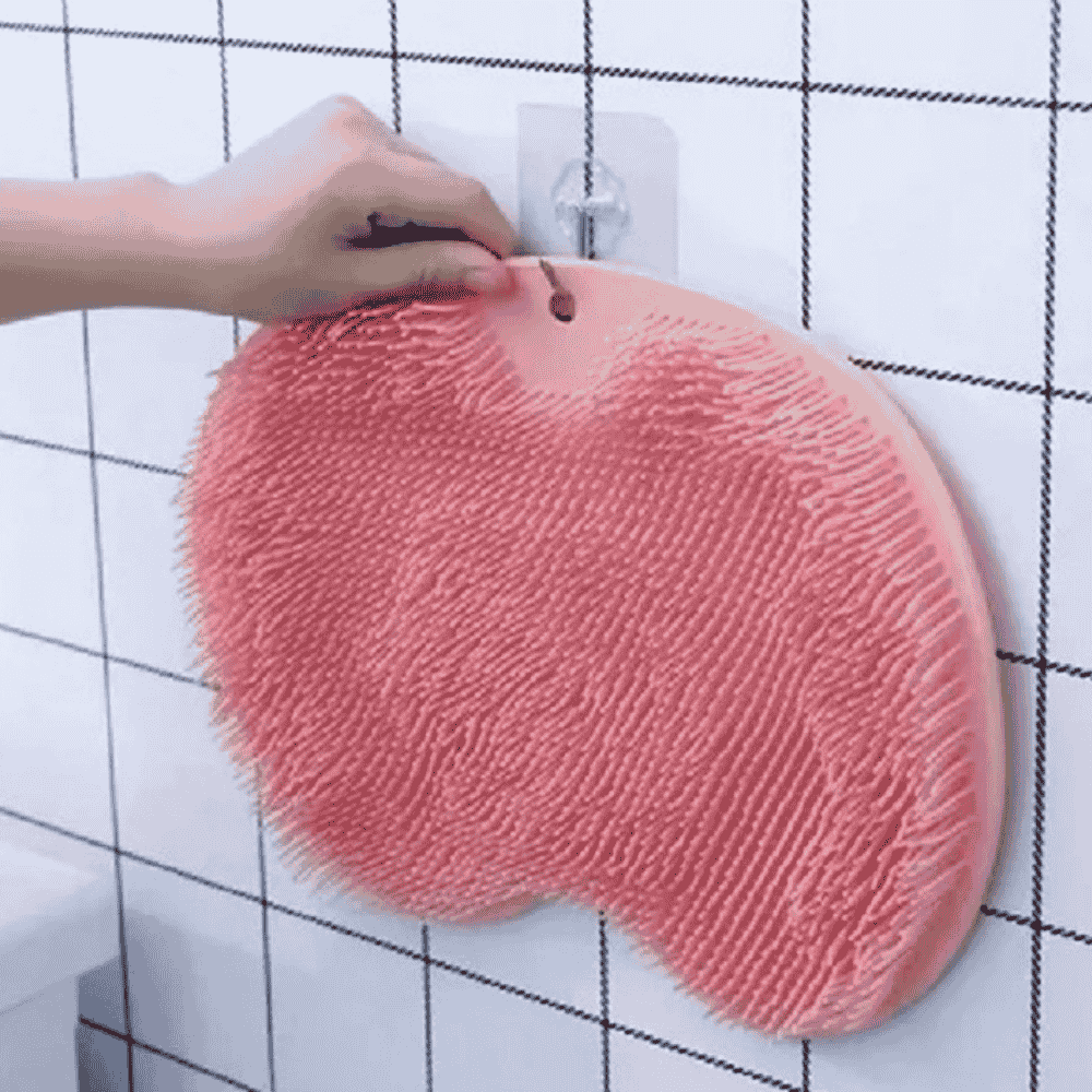 Silicone bath mat mounted on the wall, ready for back scrubbing