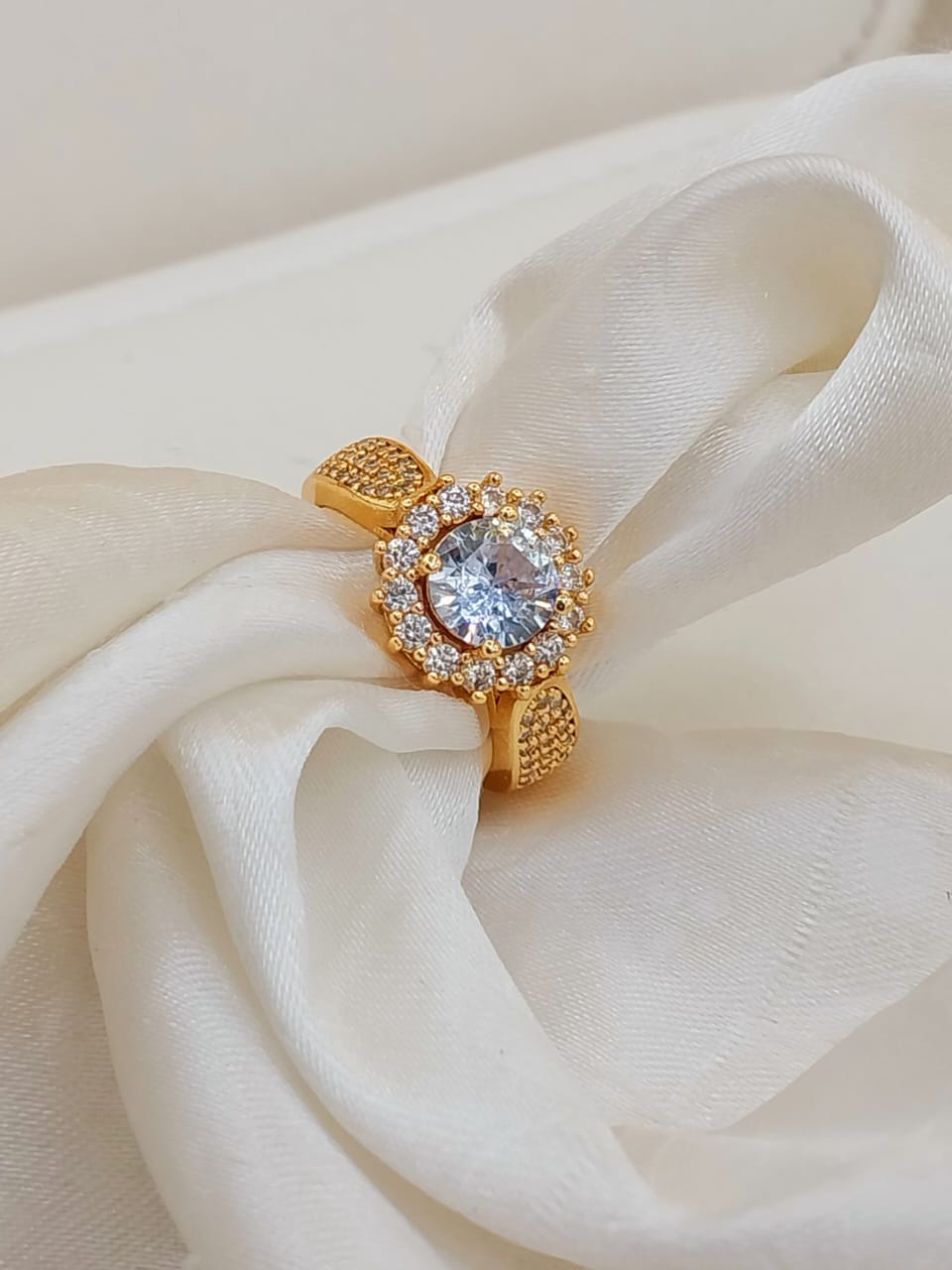 Elegant silver-toned artificial ring front view