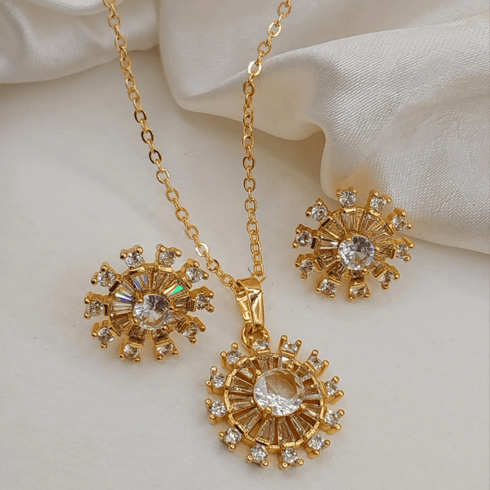 Shiny silver round locket and earrings set viewed from the front